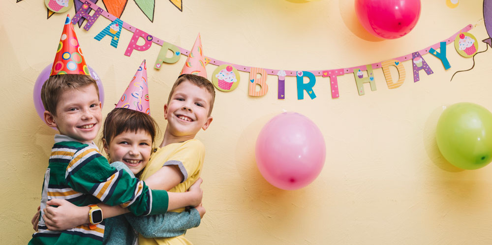 children-hugging-birthday-party